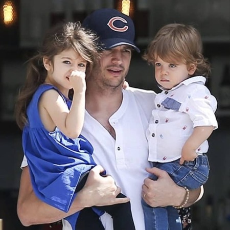 Dimitri Portwood Kutcher with his father and sister Wyatt Isabella Kutcher.